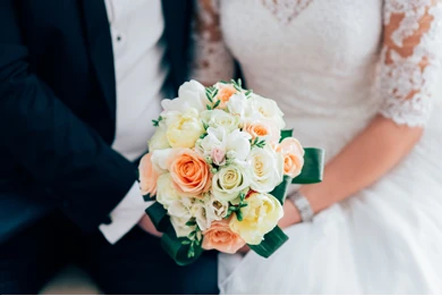 Celebration party with guests raising glasses